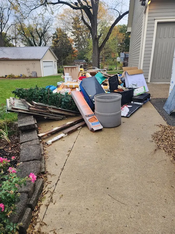 Dumpster being loaded with debris for 3 Yard Dumpster Rental in Sausalito
